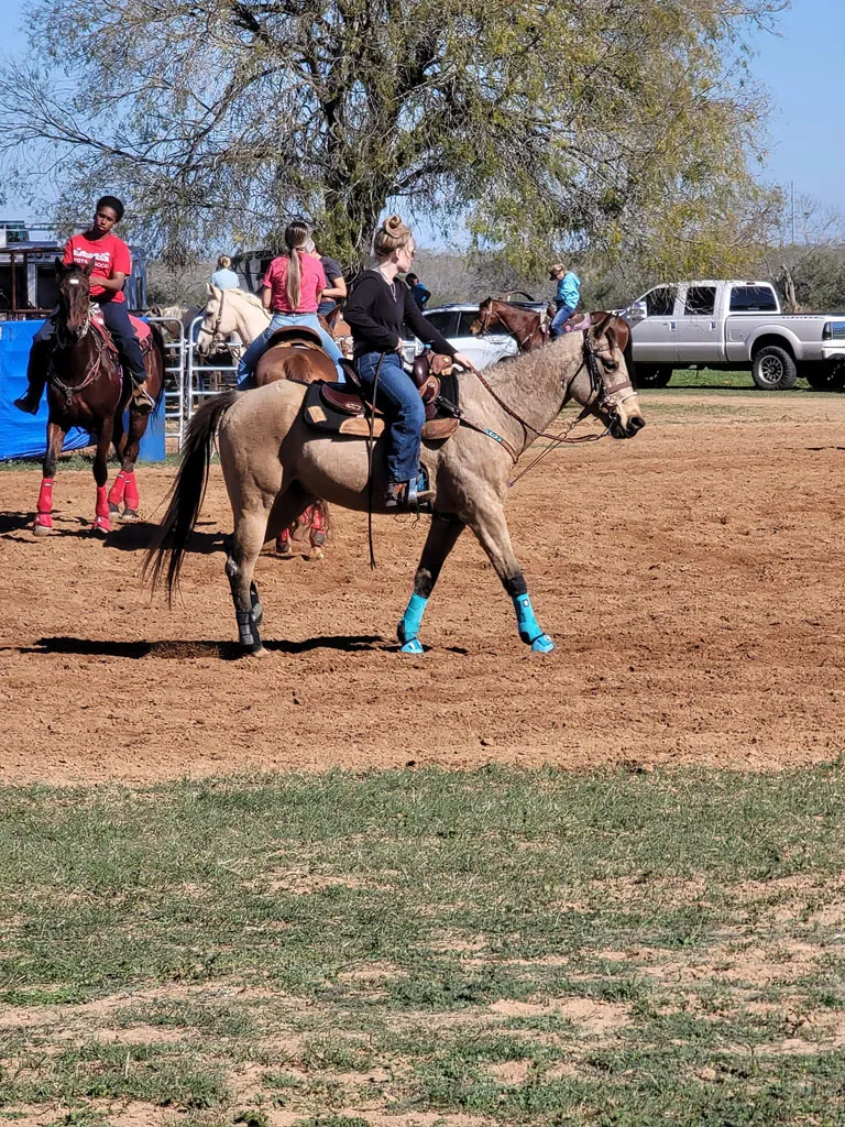 Rider on horseback at a Rich at Heart outdoor event